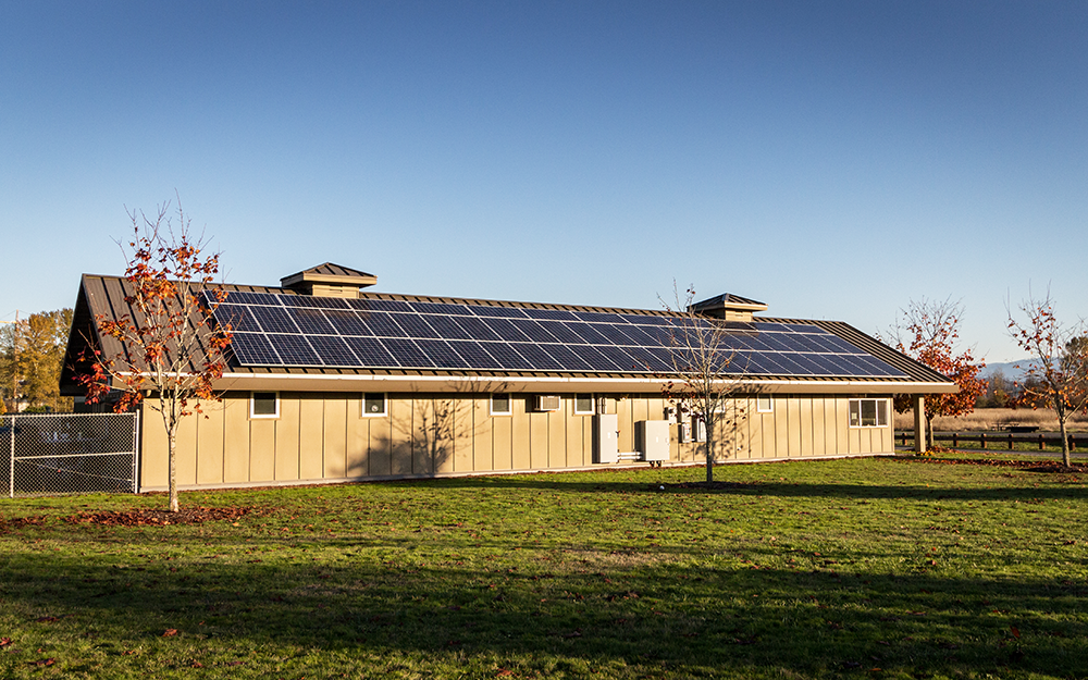 Wide shot image of North Utility Building at Marymoor Park, Washington State showing solar panels installed on roof.